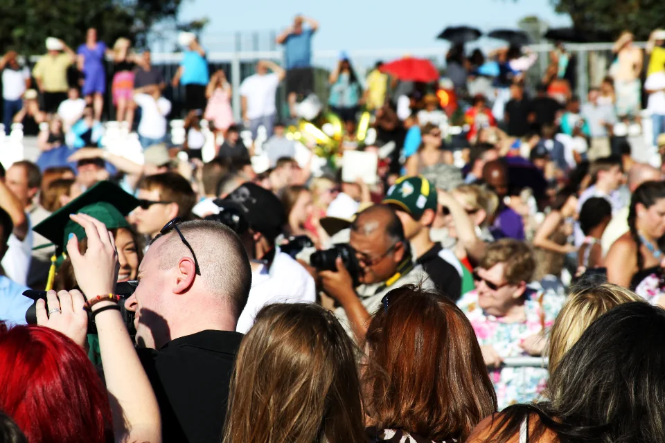 A community crowd at an outdoor event